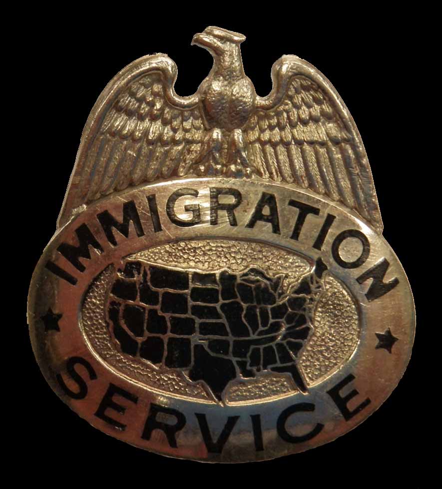 Immigration Service hat badge